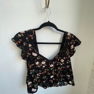 Flowy cropped peplum style delicate ruffly sleeve blouse